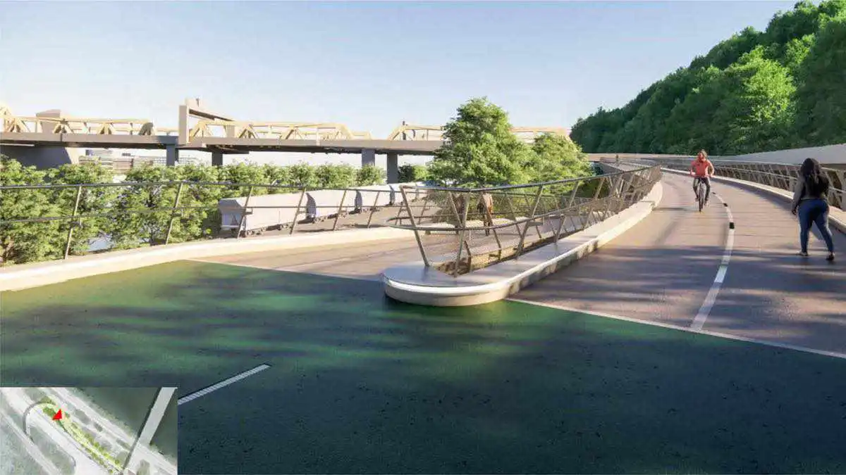Artist's rendering of a ramp leading up on the right with a bicyclist and pedestrian.   The foreground shows green pavement where the ramp turns to go down towards Carson street at the West End Bridge.   There are abundant trees and a train in the backgro