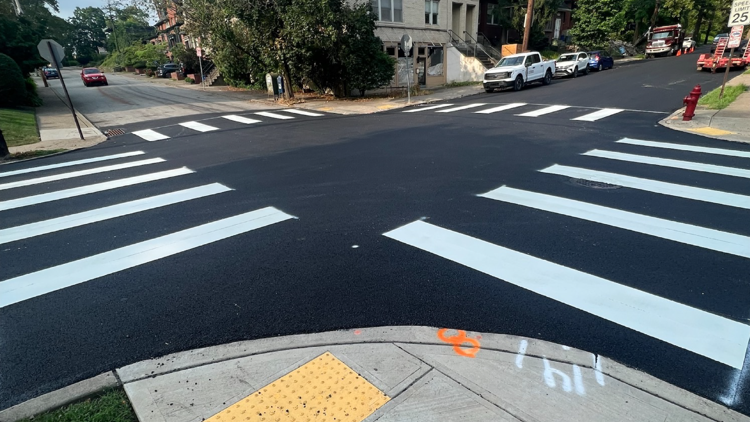 Image of freshly painted crosswalks at an intersection