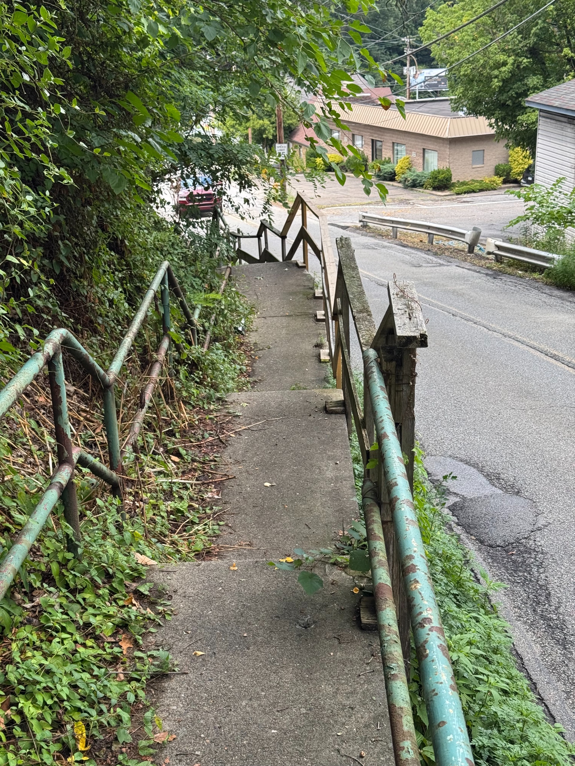 Photo of existing portion of concrete steps to be replaced. 